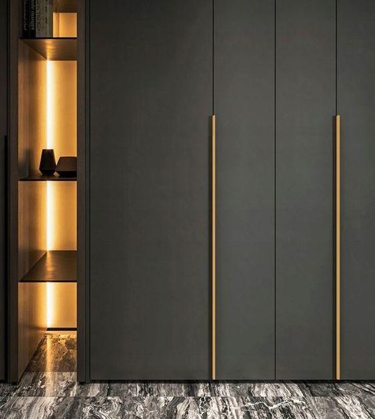 Довга торцева ручка для шафи золота брашована 1200м Long E FX-170-1200-109 фото